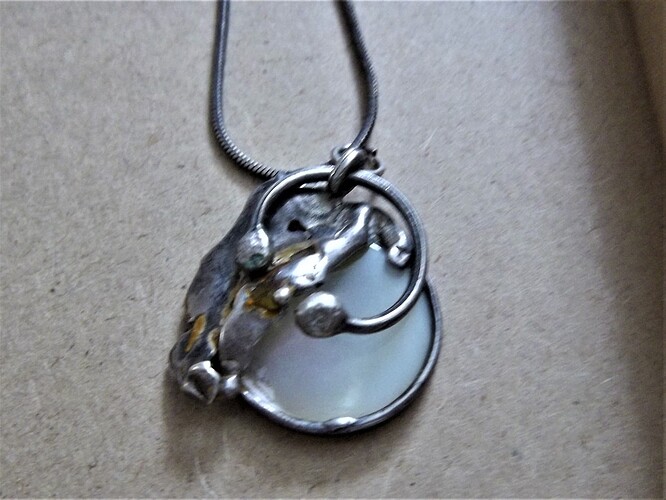 mop silver pendant